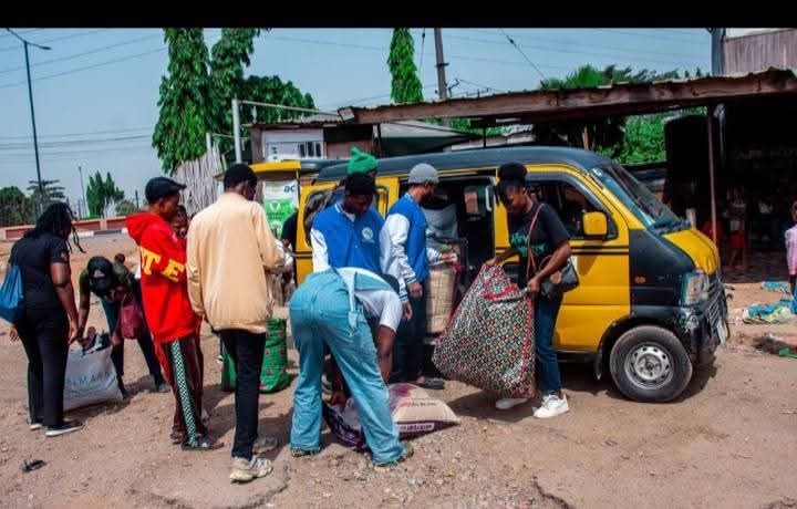 Volunteers distributing food and supplies on the street